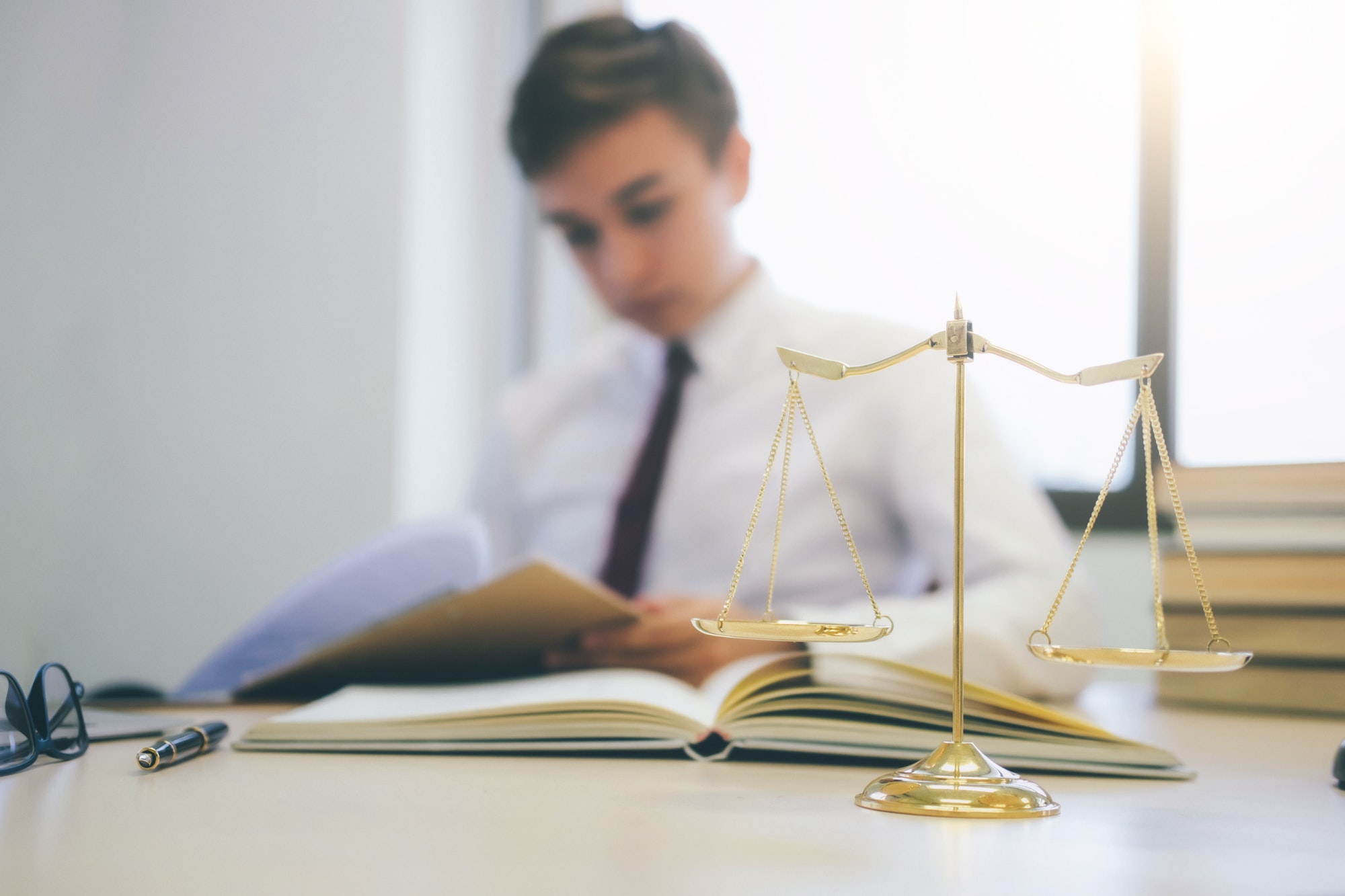 Young lawyer working in office Young lawyer working in office